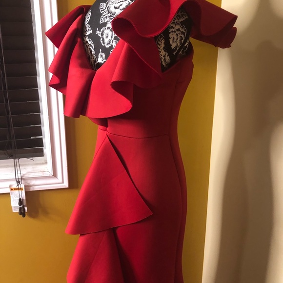 Red Formal Dress with Back detail and Billow Sleeves. Perfect for the New Year😉 - Picture 4 of 10